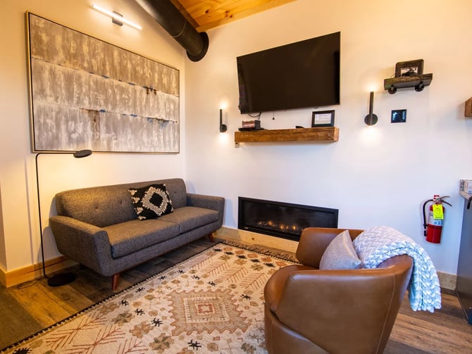 Cozy cabin living room with fireplace