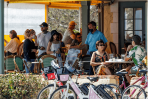 People dining outdoors.
